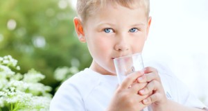 Child drinking pure water